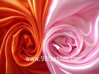 Fire-resistant polyester satin fabrics made of artifical fibers for decoration or packaging